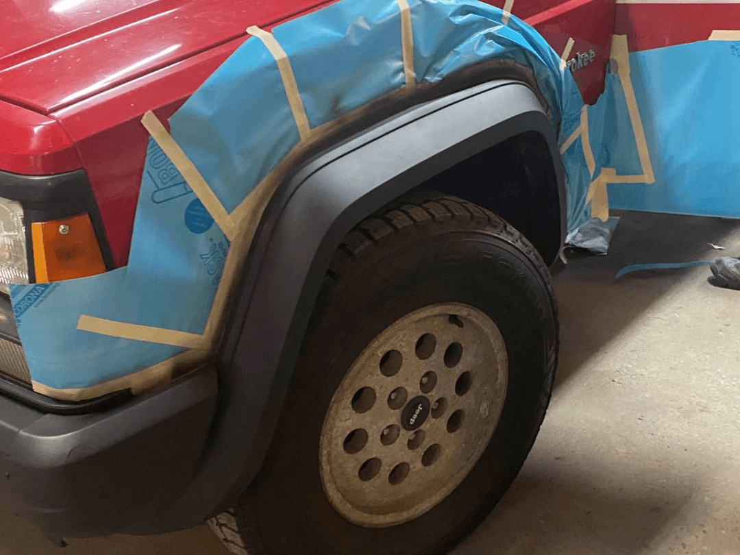 Car with dents before repair